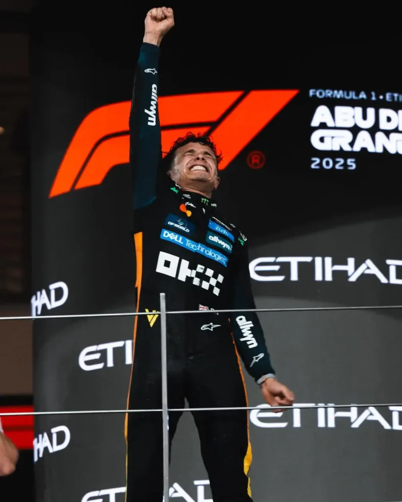 Lando Norris merayakan gelar Juara Dunia F1 2025 di podium GP Abu Dhabi. (instagram.com/mclaren)