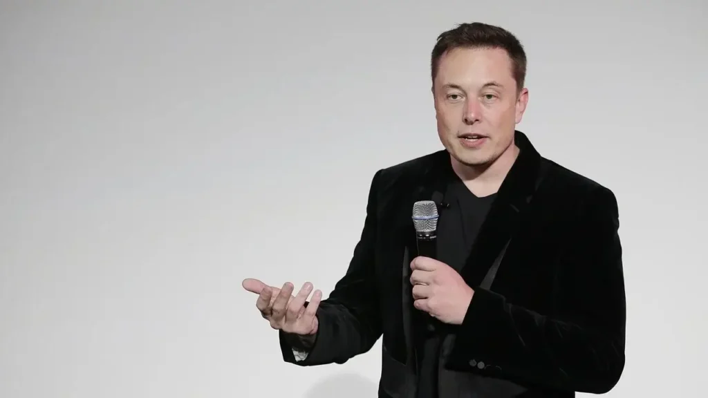 Elon Musk dalam acara teknologi saat membahas pengembangan kecerdasan buatan.