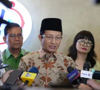 Menag Nasaruddin Umar menghadiri seminar Natal Nasional 2025 di Jakarta. (Kemenag)