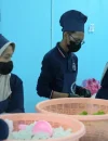 Distribusi makanan dalam Program Makan Bergizi Gratis (MBG) kepada peserta didik.