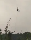 Polisi dan warga menangani karhutla di Simpang Hilir Kayong Utara dengan dukungan water bombing. (Foto: Res-KKU)