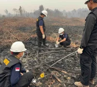 Polisi melakukan olah TKP kasus dugaan pembakaran lahan yang melibatkan anggota DPRD Mempawah. (Foto: Res-Mpw)