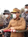Gubernur Kalimantan Barat Ria Norsan mendorong pemerataan bantuan penanganan karhutla untuk 14 kabupaten/kota di Kalbar.