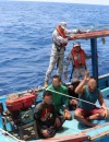 Petugas APMM mengamankan kapal yang mengangkut empat nelayan Indonesia yang diduga melakukan penangkapan ikan ilegal di perairan Sarawak, Malaysia.