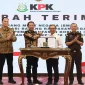Penyerahan aset rampasan oleh Komisi Pemberantasan Korupsi kepada Kejaksaan Agung senilai Rp20,2 miliar. (Foto Dok. KPK)