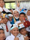 Ketua TP PKK Kalbar Erlina Norsan memberikan sosialisasi Gerakan Memasyarakatkan Makan Ikan (Gemarikan) kepada siswa dan orang tua di SD Negeri 09 Sungai Raya, Kabupaten Kubu Raya.