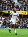 Alex Iwobi merayakan gol untuk Fulham saat menghadapi Tottenham Hotspur di Craven Cottage