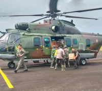 Helikopter mengangkut bantuan logistik untuk desa terdampak bencana yang terisolasi di Sumatera Utara. (BPMI Setpres/Istimewa)