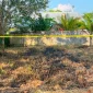 Satreskrim Polres Kubu Raya memasang police line di lokasi karhutla di Desa Kampung Arang.