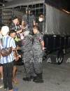 Petugas JIM Sarawak mengamankan WNI dalam operasi penguatkuasaan di Kuching, Sarawak.