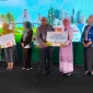 Kepala Dinas Tanaman Pangan dan Hortikultura Kalimantan Barat Herti Herawati menerima dua penghargaan nasional terkait pendataan eRDKK dan penyaluran pupuk bersubsidi.