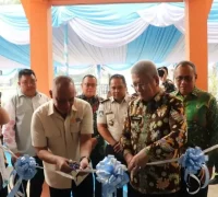 Sekda Kalbar Harisson meresmikan Layanan Terpadu Satu Atap PMI di Kantor Disnakertrans Kalbar.