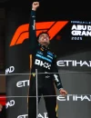 Lando Norris merayakan gelar Juara Dunia F1 2025 di podium GP Abu Dhabi. (instagram.com/mclaren)