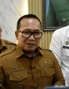 Bupati Kubu Raya Sujiwo usai memimpin rapat pengawasan program Makan Bergizi Gratis (MBG) bersama jajaran pemerintah daerah untuk memastikan target zero keracunan.