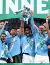 Para pemain Manchester City merayakan kemenangan Piala Liga usai mengalahkan Arsenal di Stadion Wembley.