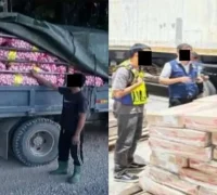 Petugas Pasukan Gerakan Am Sarawak memperlihatkan barang bukti hasil sitaan operasi pemberantasan penyelundupan ilegal.