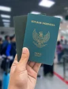 Ilustrasi paspor Indonesia sebagai dokumen kewarganegaraan terkait pemberlakuan tarif resmi pelepasan status WNI sebesar Rp5 juta.