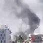 Asap membumbung dari bangunan di Lebanon usai serangan udara Israel yang menewaskan sedikitnya 16 orang.