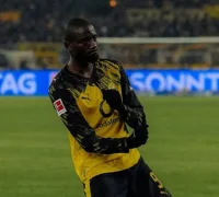 Serhou Guirassy merayakan gol saat Borussia Dortmund menang 4-0 atas Mainz 05 di Bundesliga.