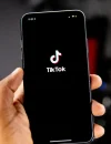 Logo TikTok pada layar ponsel.