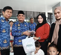 WhatsApp Image 2025-10-17 at 11.42.34 Wakil Wali Kota Pontianak Bahasan menyerahkan paket ikan segar secara simbolis bagi balita rentan stunting di Pontianak Utara.