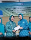 Ketua TP PKK Kota Pontianak Yanieta Arbiastutie Kamtono menerima kunjungan kerja Ketua TP PKK Provinsi Kalbar Erlina Ria Norsan dalam rangka monitoriing dan evaluasi percepatan sinkronisasi program kerja PKK.