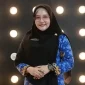Dr. Herwulan Irine Purnama, M.Pd, Kepala Sekolah SDN 35 Pontianak Selatan memberikan pandangan tentang fenomena brainrot pada anak.