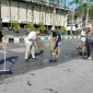 Petugas tengah membersihkan lapangan di depan Kantor Wali Kota, Jalan Rahadi Usman, yang akan digunakan untuk pelaksanaan Salat Idulfitri 1447 Hijriyah.