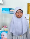 Aila Afifah (13), siswi Kelas VInSD LKIA Pontianak menjadi jemaah calon haji termuda asal Kota Pontianak.