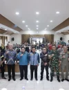 Kepala Bapperida Pontianak Sidig Handanu saat membuka rapat koordinasi percepatan proyek SPALD-T di Aula Rohana Muthalib Pontianak.