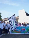 Sekretaris Daerah Kota Pontianak Amirullah saat melepas peserta Funwalk dalam rangka Hari BPR-BPRS Nasional di Halaman Museum Kalbar, Minggu (31/5/2026) pagi.