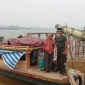 Motor air milik Hasan Karmana yang sebelumnya menjadi tempat tinggal sementara setelah rumahnya di tepian Sungai Kapuas roboh di Pontianak.