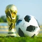 Ilustrasi trofi Piala Dunia FIFA 2026 dengan latar stadion sepak bola internasional dan logo turnamen.