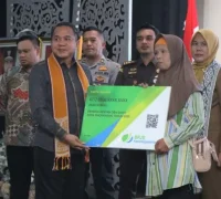 Pemkot Singkawang bersama BPJS Ketenagakerjaan luncurkan program jaminan sosial pekerja rentan. (MC Singkawang)