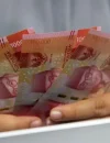 Kebijakan Bank Indonesia melalui BI Rate dan SRBI dalam menjaga stabilitas nilai tukar rupiah di tengah tekanan pasar.