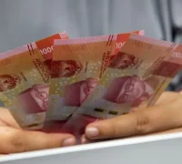 Kebijakan Bank Indonesia melalui BI Rate dan SRBI dalam menjaga stabilitas nilai tukar rupiah di tengah tekanan pasar.