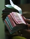 Ilustrasi - nilai tukar rupiah terhadap dolar AS yang mendekati Rp17.000 di tengah gejolak pasar keuangan global.