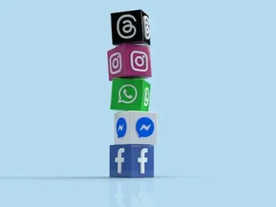 Logo Meta dengan tampilan aplikasi Facebook, Instagram, dan WhatsApp.